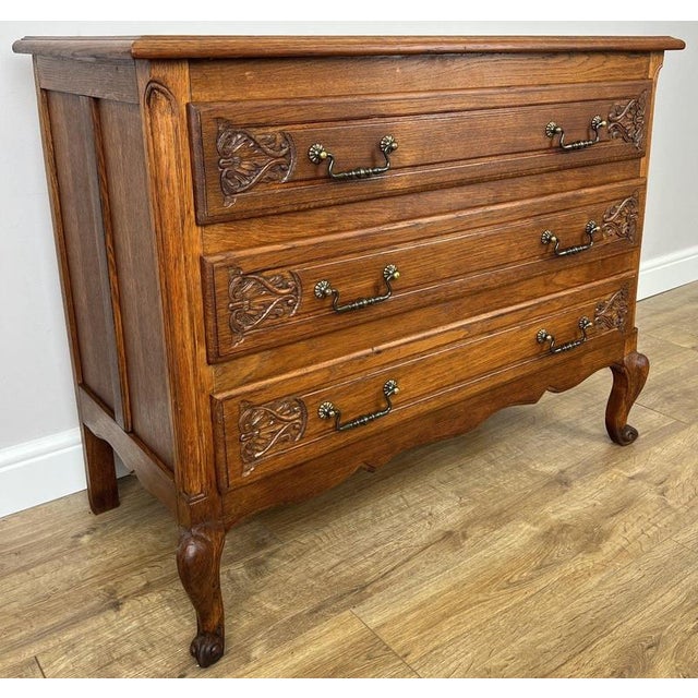 Enhance your home with the timeless elegance of this Vintage French Louis Chest of Drawers , beautifully crafted in oak...