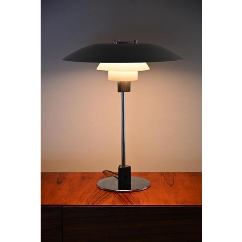 Louis poulsen ph 4/3 table lamp designed by danish designer poul henningsen. The ph series is probably the most well known...