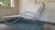 An elegant vintage chaise lounge attributed to Walter Lamb, featuring a tubular bronze frame and woven nautical rope...