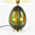 A striking vintage Murano glass table lamp by VeArt, featuring rich green, red striped glass with elegant brass accents....