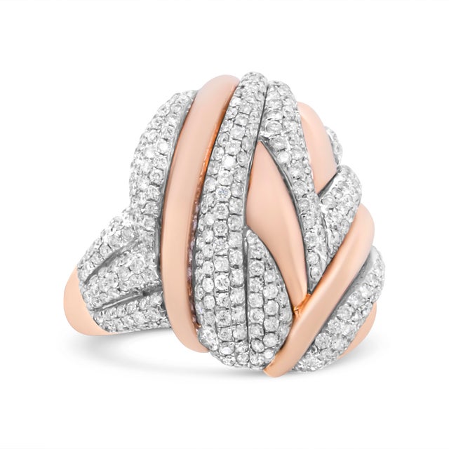 An oval ring with an all-encompassing bypass design, this modern and luxurious ring is the addition to your jewelry...