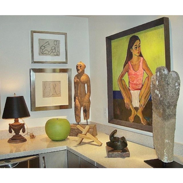 Handsome pair of vintage cast iron urn finials as a lamp. Imagine how elegant they would look with a black or white empire...