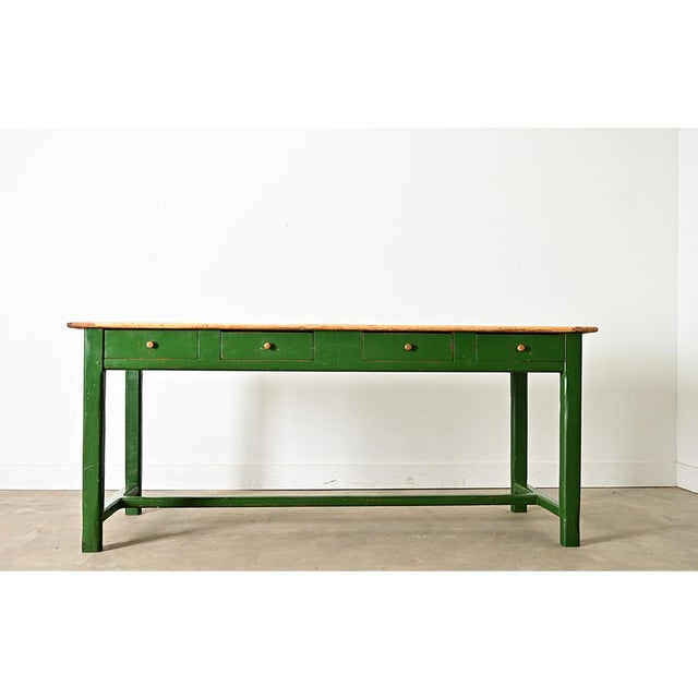 A unique, Kelly-green painted farm table from 19th century England formerly a kitchen prep table and other homestead work,...