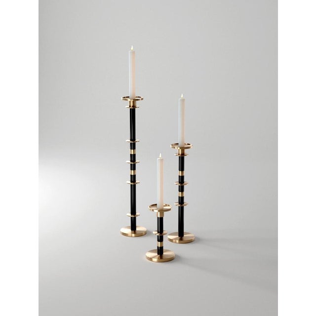 Set of 3 maïa candleholders in solid brass & aluminum by studio marine breynaert. Dimensions: ø 10 x h 51.5 cm (large), ø...