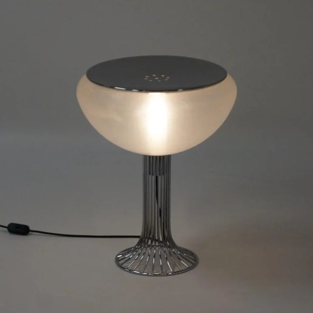 Guzzini table lamp Moana designed by Luigi Massoni (1930 – 2013) in 1967. The Moana series contains a floor lamp, a...
