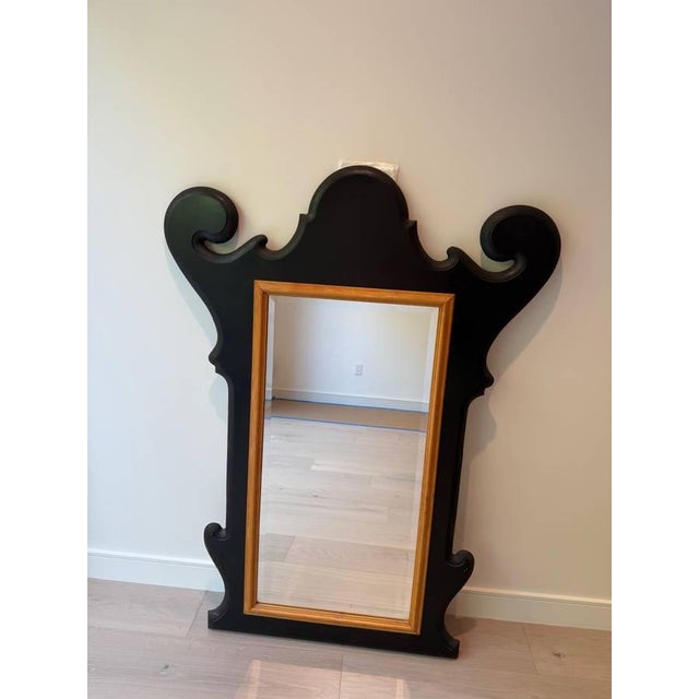 Beautiful, one-of-a-kind custom wall mirror. This substantial piece features a striking architectural silhouette inspired...