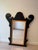 Beautiful, one-of-a-kind custom wall mirror. This substantial piece features a striking architectural silhouette inspired...