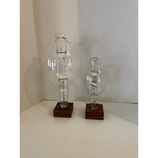 1940s Vintage Retro High Pressure Sodium Industrial Bulb Display on Wood Pedestal Marked "Roost" - Set of 2 For Sale - Image 5 of 8