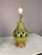 Ceramic green textured pottery decorative lamp with teak wood base. Working condition corded electric. Dimensions: Vase:...