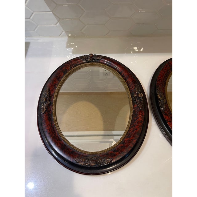 A pair of Victorian faux grain painted mirrors. These mirrors are in very good to excellent antique condition. They were...