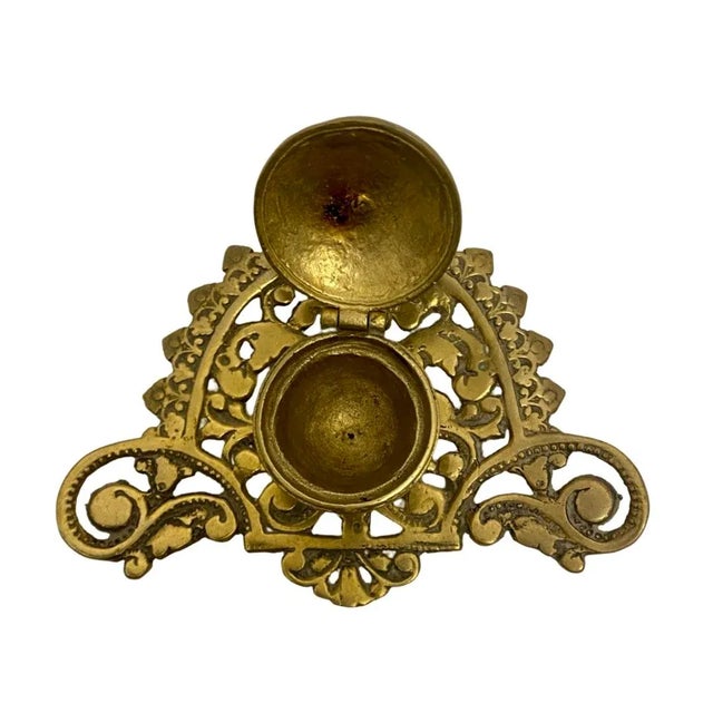 Antique Ornate Art Nouveau Brass Inkwell. Condition is preowned. Please see all pictures before purchase. Item measures...