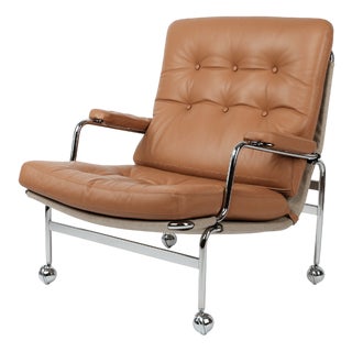 Karin Lounge Chair in Cognac Leather by Bruno Mathsson for Dux For Sale