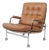 Karin Lounge Chair in Cognac Leather by Bruno Mathsson for Dux For Sale