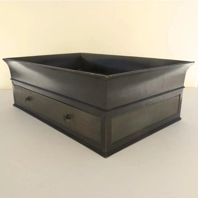 Very chic ebonized wood stand. Original purpose probably to hold a desk set. Measures 21" by 14" by 7 1/2". c 1840 Show...