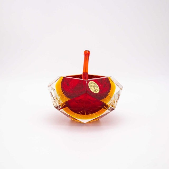 This beautiful ashtray in the Sommerso technique made of yellow, red and clear glass is a true work of art from the 1950s....
