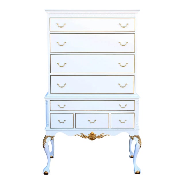 1960's Solid built Chippendale highboy of six drawers. This highboy is newly refinished in white and gold with satin...