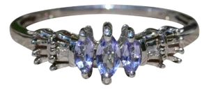 The Crisantemo: Ladies Delicate White Gold Ring set with Marquise Tanzanite and Diamonds