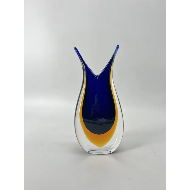 Murano glass vase handmade by a famous master of the island with the "sommerso" technique. This method involves...