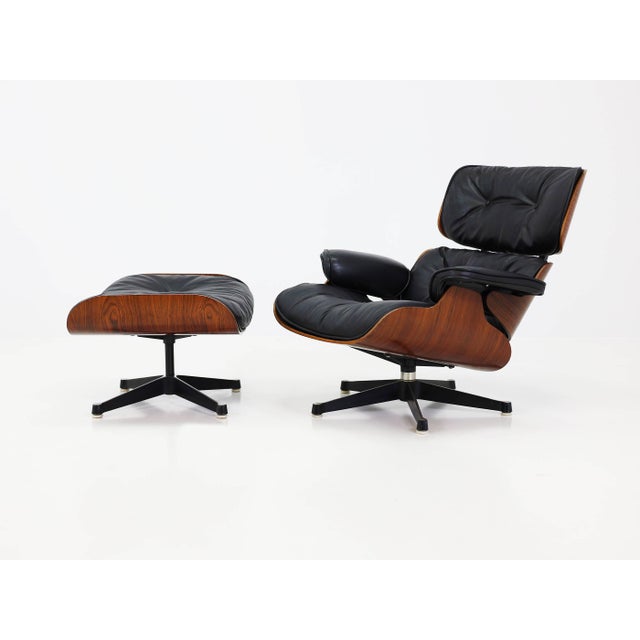 Set of Model 670 Lounge Chair and Ottoman in Rosewood and Black Leather by Charles & Ray Eames for Herman Miller, USA,...
