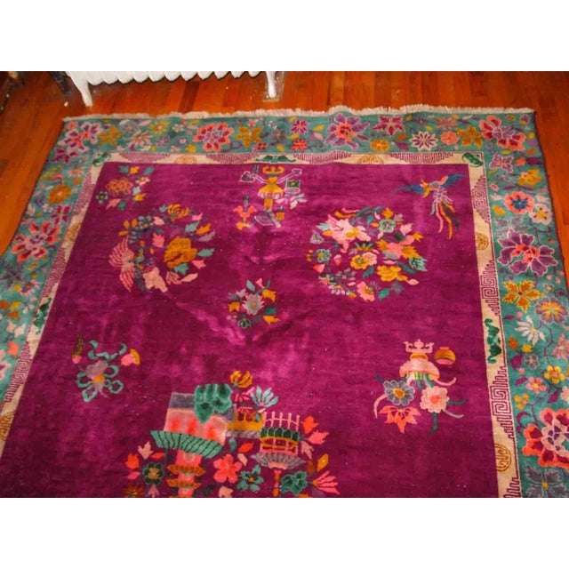 Handmade antique Art Deco Chinese rug in original good condition, the rug is from the beginning of 20th century....