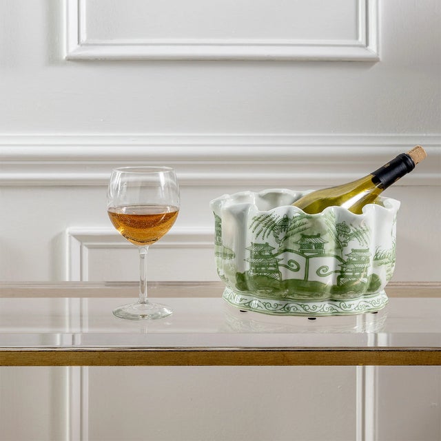 Green Willow is our classic chinoiserie inspired Asian scenic tableau in green and white. The scalloped porcelain planter...