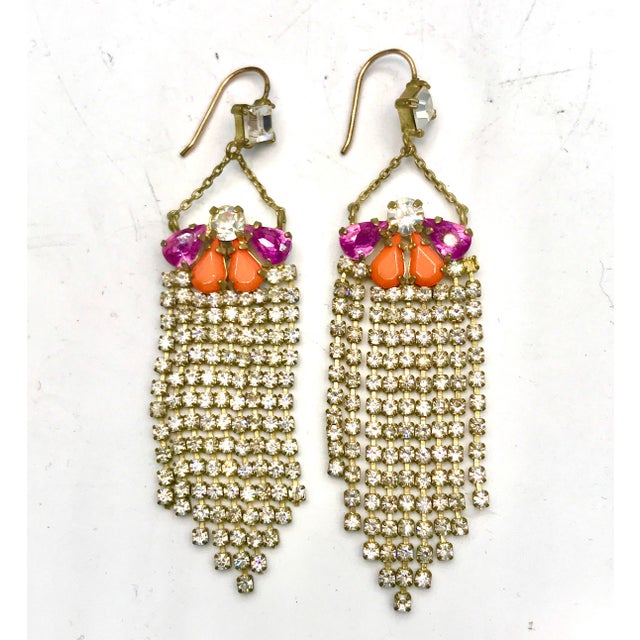 This is part of Chairish’s Costume Jewelry assortment. Stunning rhinestone fringe flapper earrings adorned with...