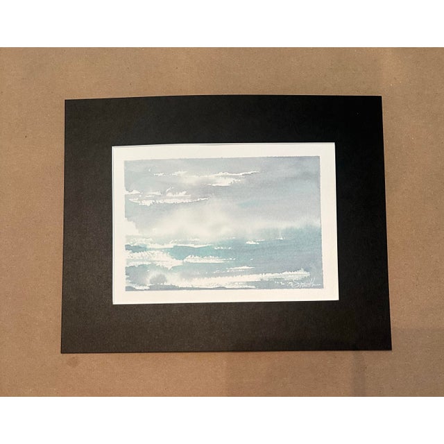 Quiet Horizon is an original watercolor capturing the peaceful atmosphere of an expansive blue horizon. Soft washes of...