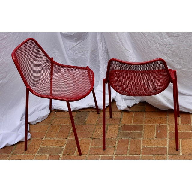 Italian Steel Tube & Mesh Indoor/Outdoor Chairs Designed by Christophe. The seat and back, shaped through a stamping...