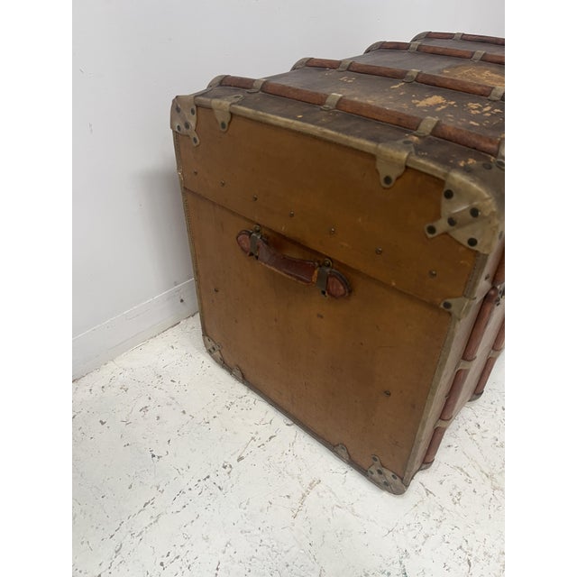 Antique wooden and metal travel trunk Attractive interior with compartments, small drawers, and a storage tray Good...