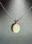 40 Carat Oval Ethiopian Opal Pendant / Necklace 14 Karat White Gold Necklace For Sale - Image 13 of 18
