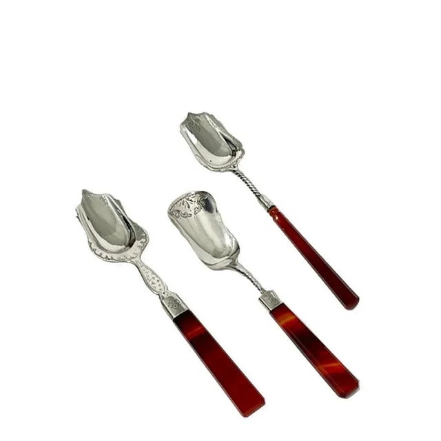 Dutch 19th century silver sugar spoons with agate handles Dutch Biedermeier sugar spoons of silver with engraving and...