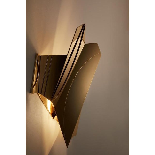 Geometric cross bitume 03 wall lamp by jennifer midoz dimensions: d 32 x p 17 x h 45 cm materials: pale gold on polished...