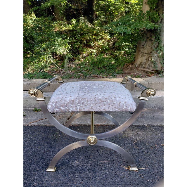 Striking vintage Hollywood Regency curule bench featuring a sculptural X-form frame in polished nickel with contrasting...