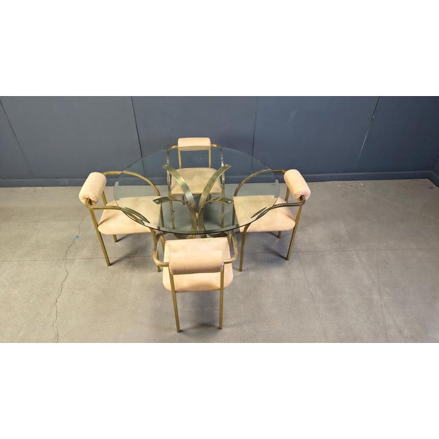 Vintage dining set by Belgochrom consisting of a dining table with a curved brass 4legged base and a clear glass beveled...