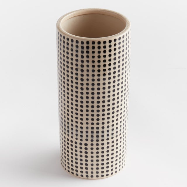 Classic, with a somewhat contemporary edge, this vase is made for the transitional space. A tight repeating dot pattern...