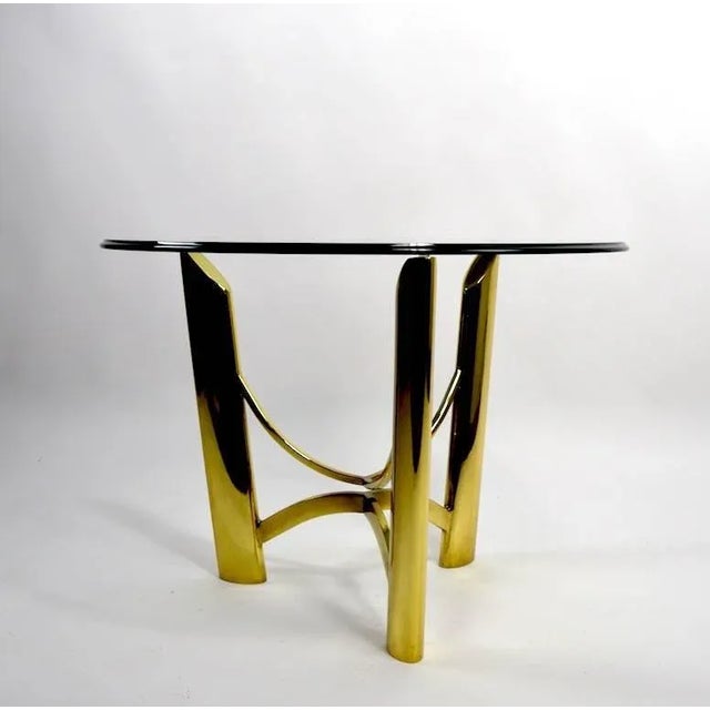 Nice modernist brass base, plate glass top side, or end table, attributed to Mastercraft. Very good, original condition,...