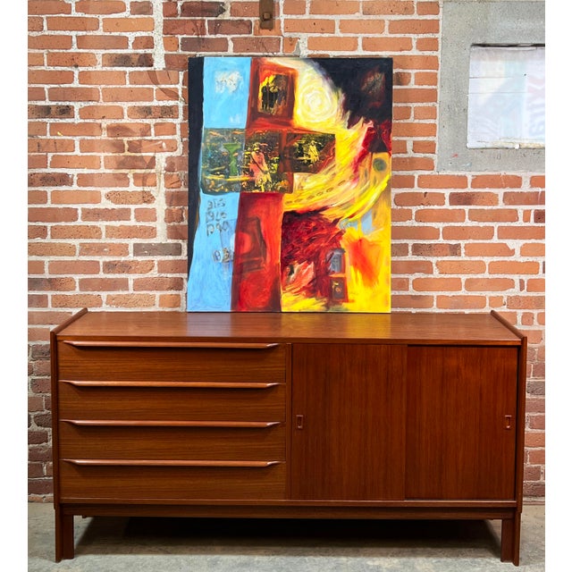 This bold and expressive mixed media painting blends abstract expressionism with vintage collage elements, creating a...