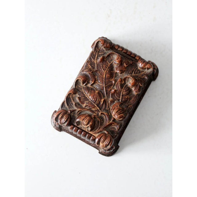 This is a vintage Syroco Wood cigarette box circa 1940s. Cast composite wood shapes the box giving it a hand-carved look....