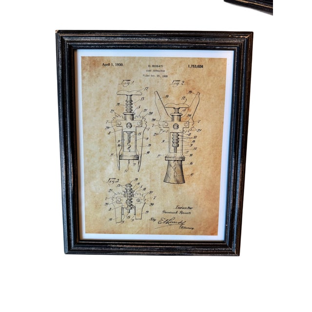 A striking set of four vintage-inspired patent prints featuring early wine and barware inventions, each rendered in...
