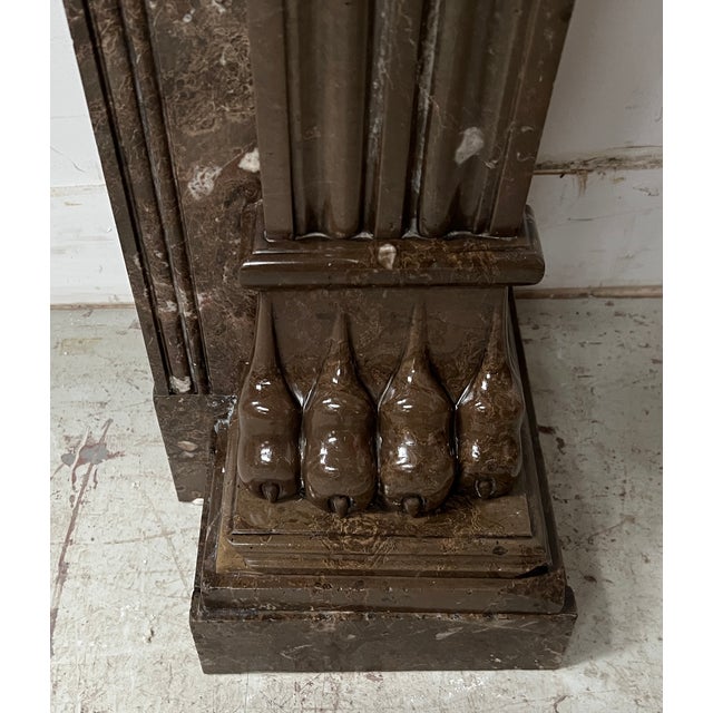Napoleon iii style fireplace with speckled marble claw feet two curved jambs decorated with recessed fluting and claw feet...