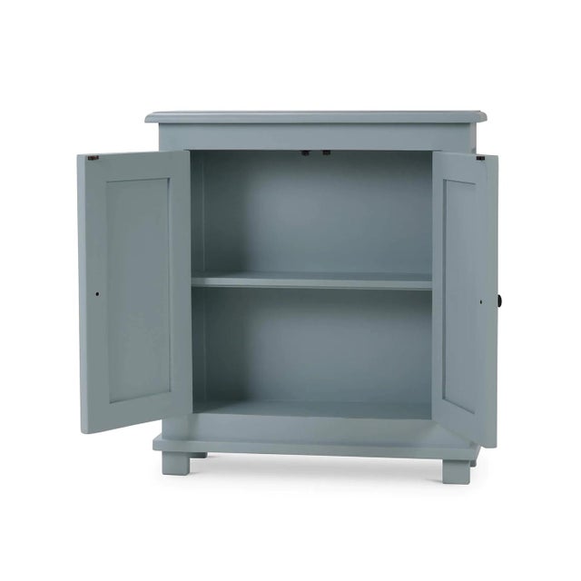 Crafted from solid mahogany and finished in our lightly distressed Ocean Blue finish, this cabinet ensures durability and...