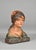 French antique bust of a young girl in plaster a pretty polychrome plaster bust of a young girl wearing a headscarf with...