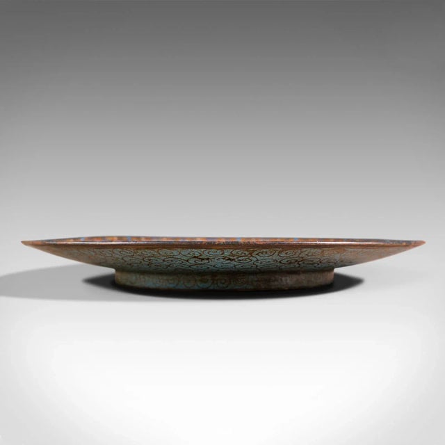 This is an antique decorative plate. A Japanese, cloisonne fruit serving dish, dating to the early Victorian period, circa...