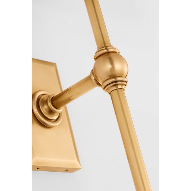 Classic 19" Tail Sconce in Antique-Burnished Brass with Linen Shades Designer: Chapman & Myers Finish: Antique-Burnished...