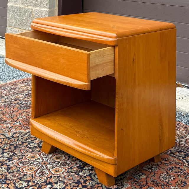 A mid century Modern Kling Furniture Maple Modern collection solid maple bowfront nightstand having one dovetailed drawer...