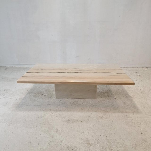 Very nice Italian coffee or side table, fabricated in the 1980s. It is handcrafted out of very beautiful marble. The...