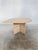 An elegant 1970s teardrop-shaped coffee table crafted from beautiful natural travertine. The sculptural organic...
