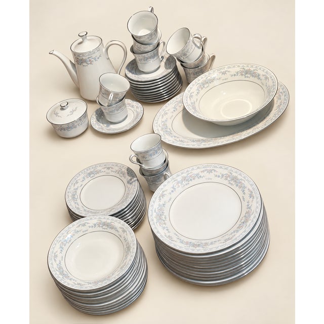 Vintage mid-century fine china dinnerware set by Fairfield in the classic, romantic "Rosepoint" pattern. This set features...