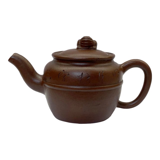 Chinese Handmade Yixing Zisha Clay Teapot With Artistic Accent For Sale