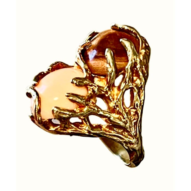 One of a kind, Arthur King inspired Brutalist gold ring, set with a cabochon natural coral stone and a large, uncut...